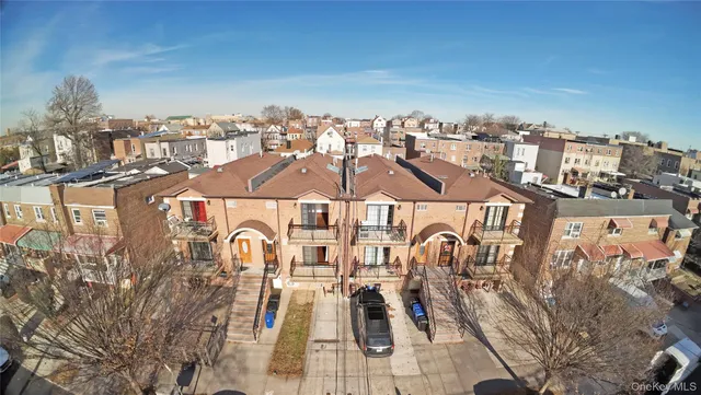 a view of a city with tall buildings