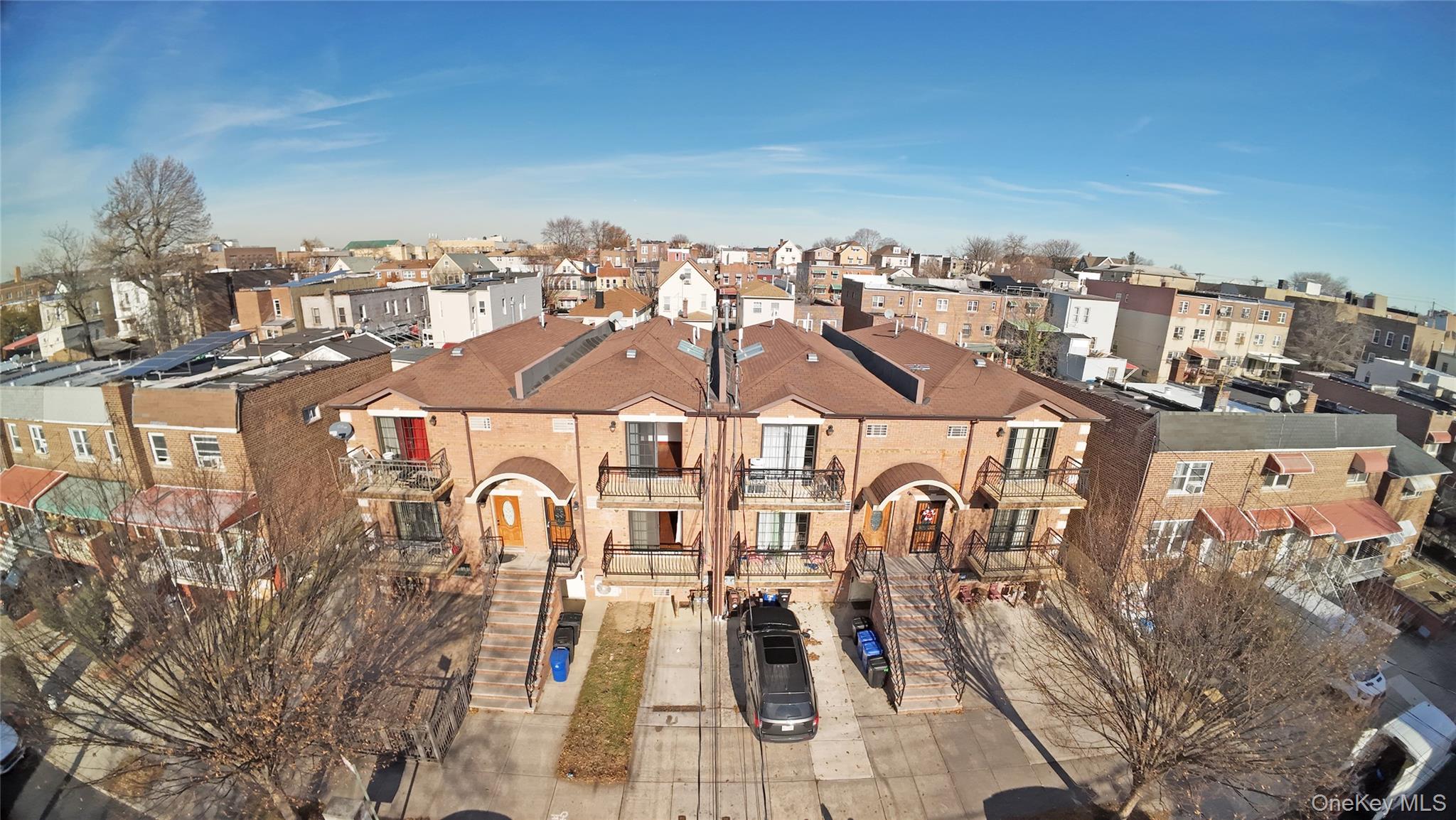 a view of a city with tall buildings