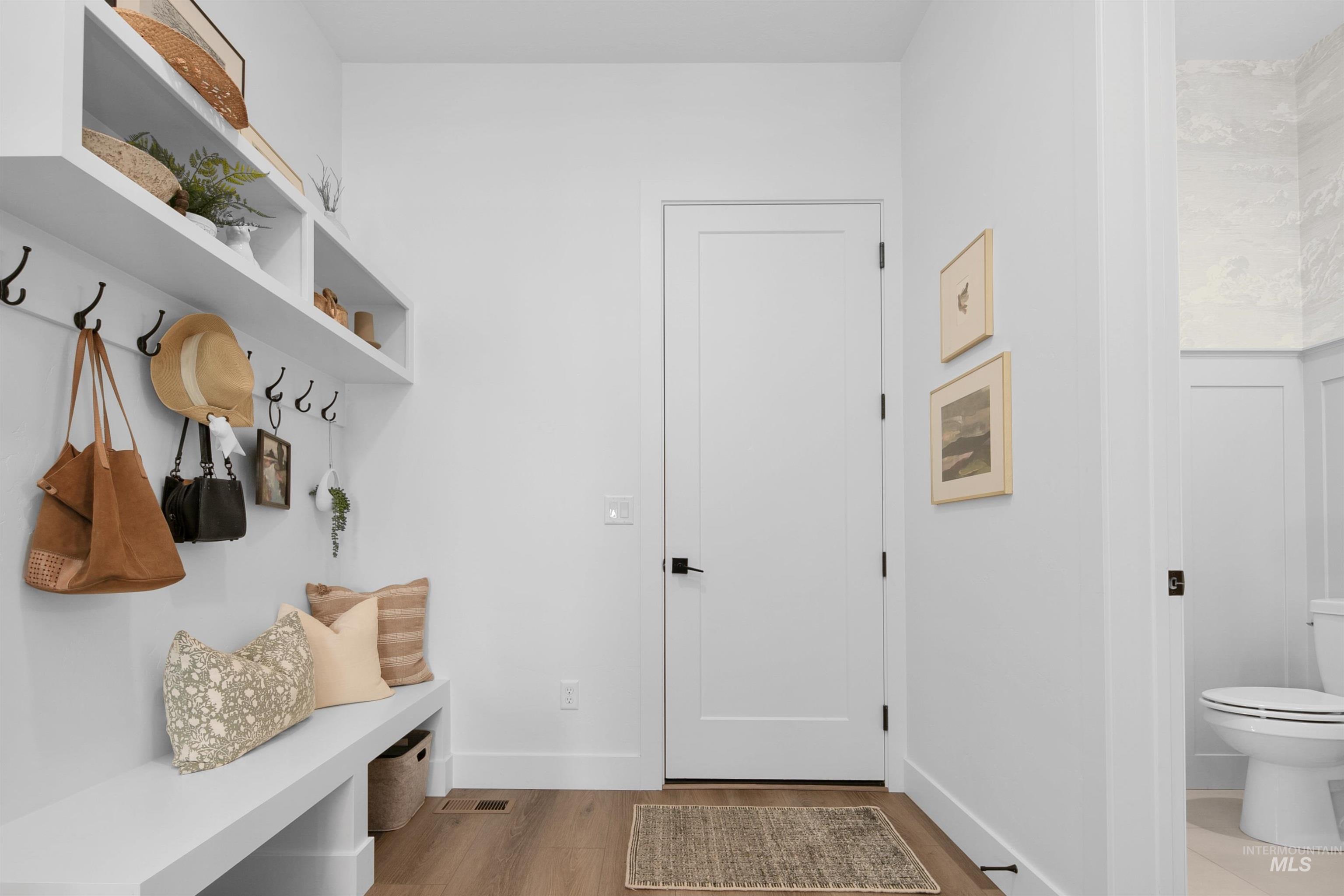 23910 Timber Hls Road Caldwell, ID 83607 - Photo 20 of 50 Mudroom with wood finished floors and baseboards