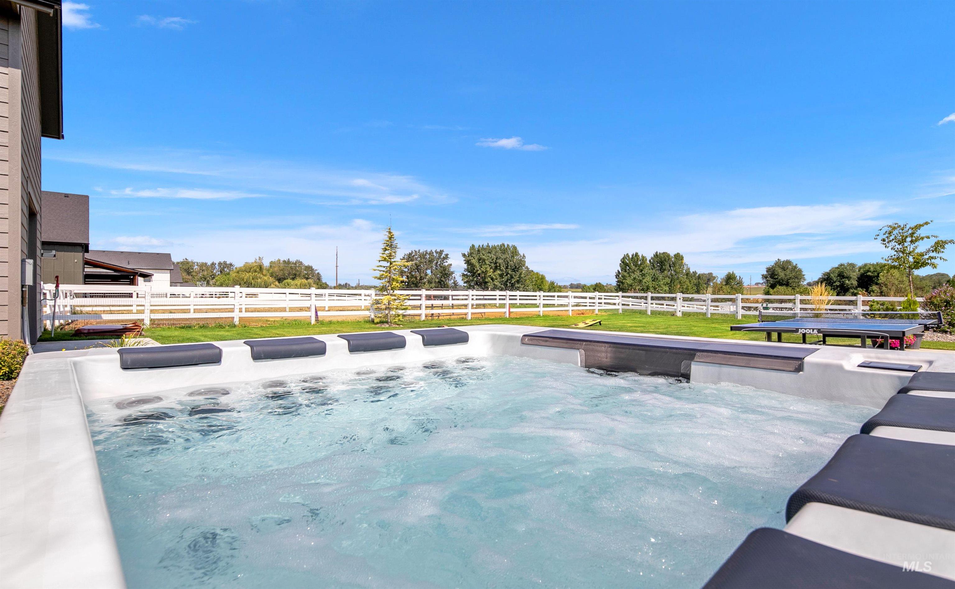 23910 Timber Hls Road Caldwell, ID 83607 - Photo 24 of 50 View of pool with a hot tub