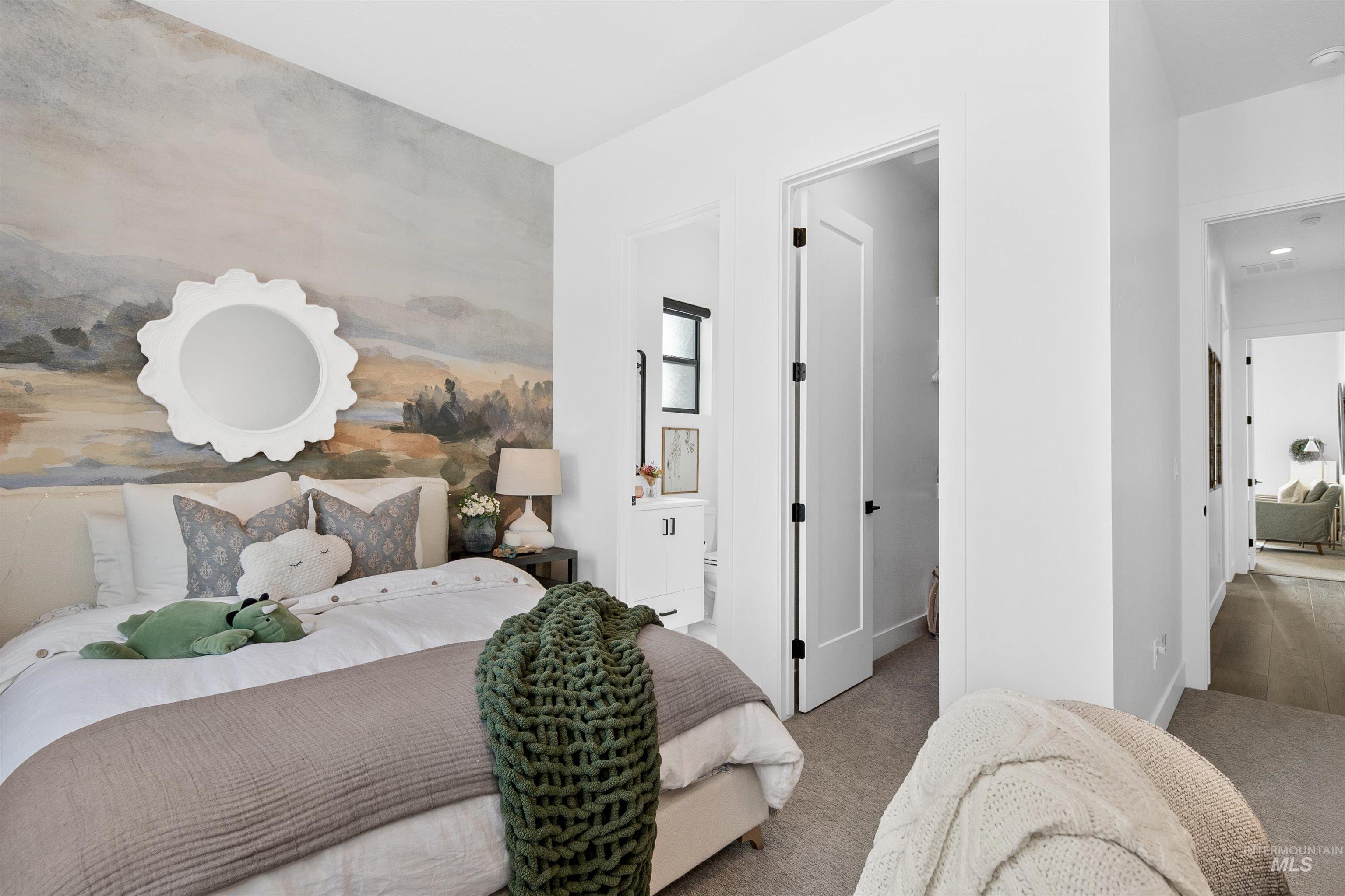 23910 Timber Hls Road Caldwell, ID 83607 - Photo 29 of 50 Carpeted bedroom featuring ensuite bathroom and baseboards