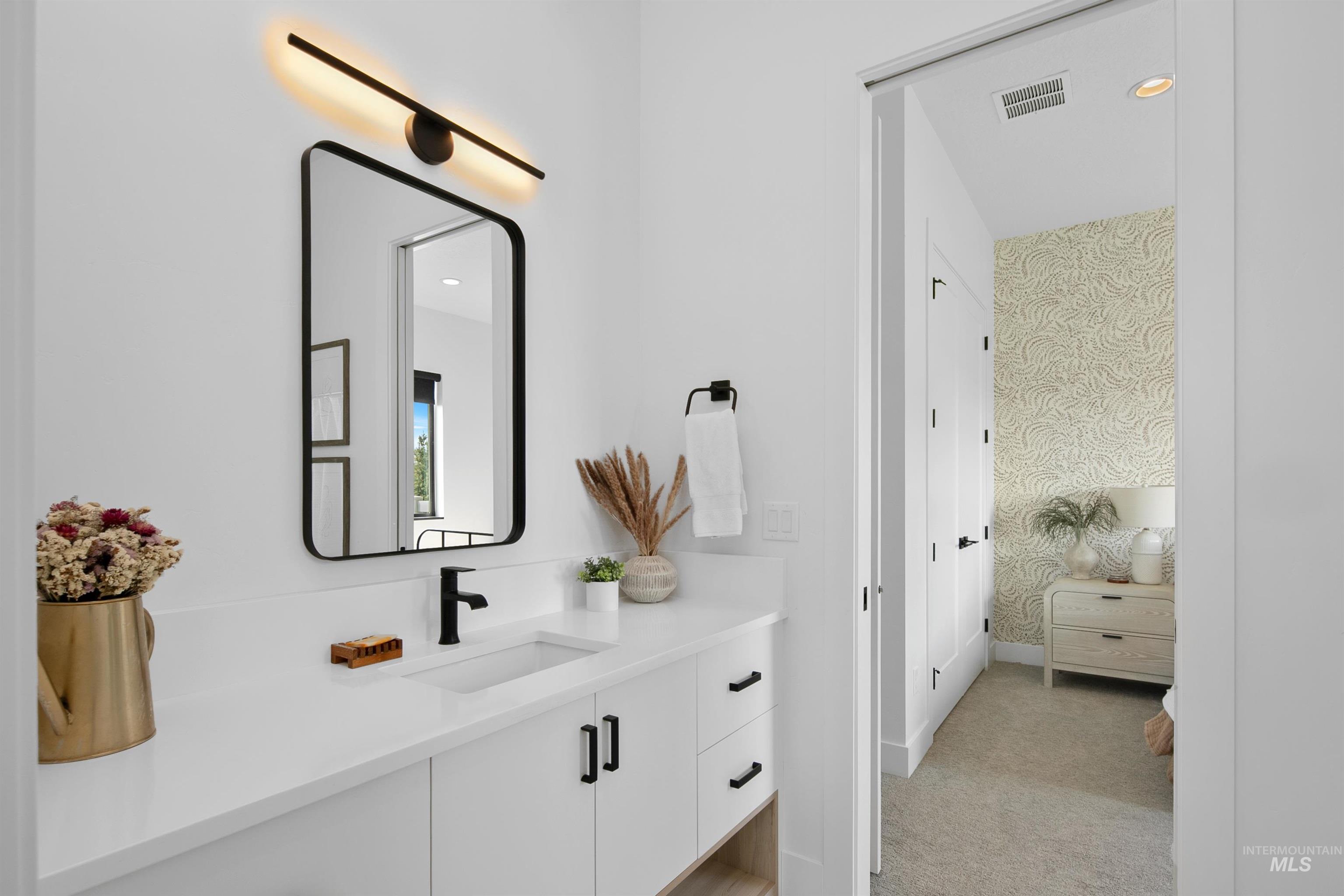 23910 Timber Hls Road Caldwell, ID 83607 - Photo 35 of 50 Bathroom with vanity, wallpapered walls, and recessed lighting