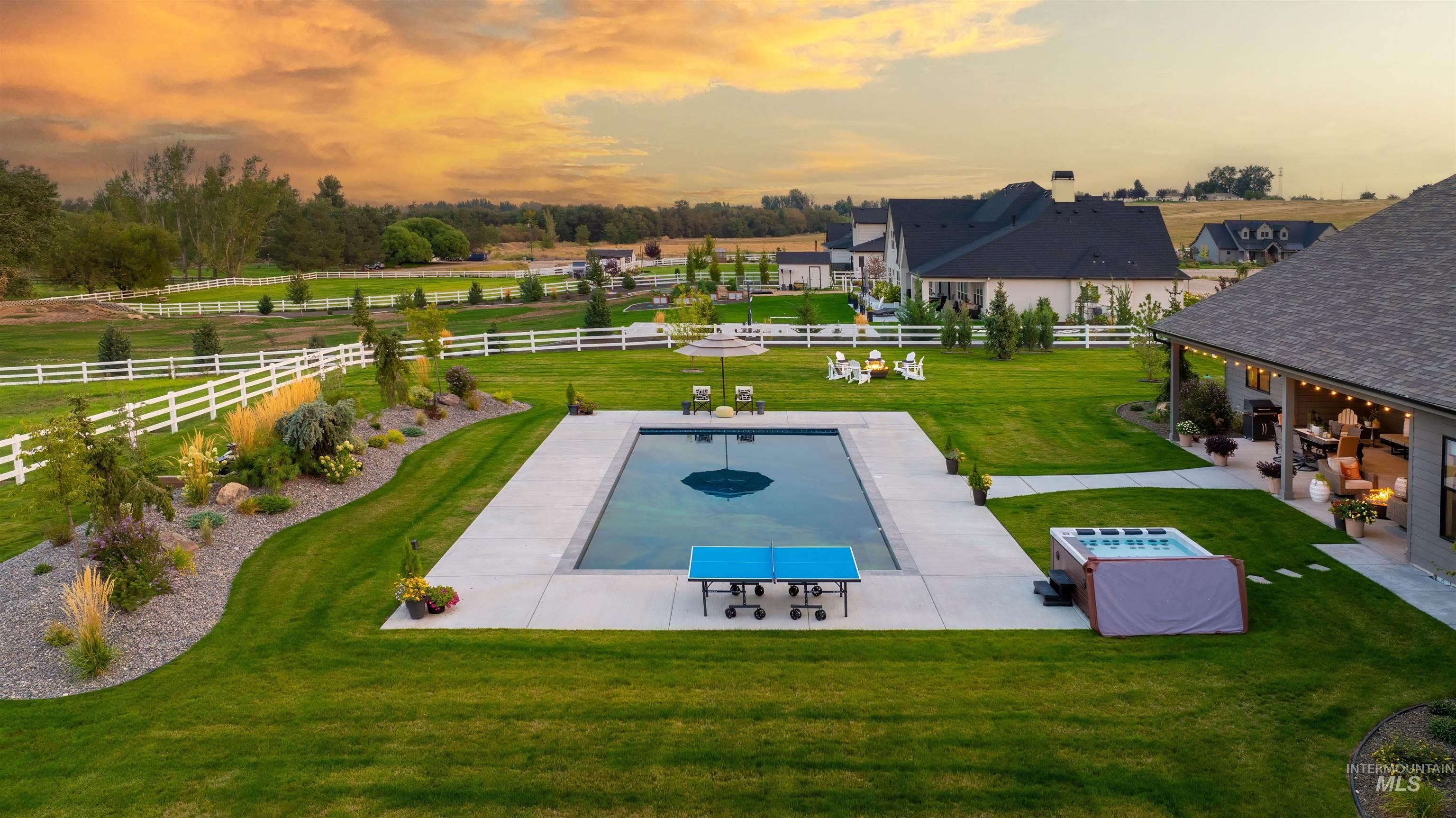 23910 Timber Hls Road Caldwell, ID 83607 - Photo 46 of 50 Exterior space with a patio area and a view of countryside