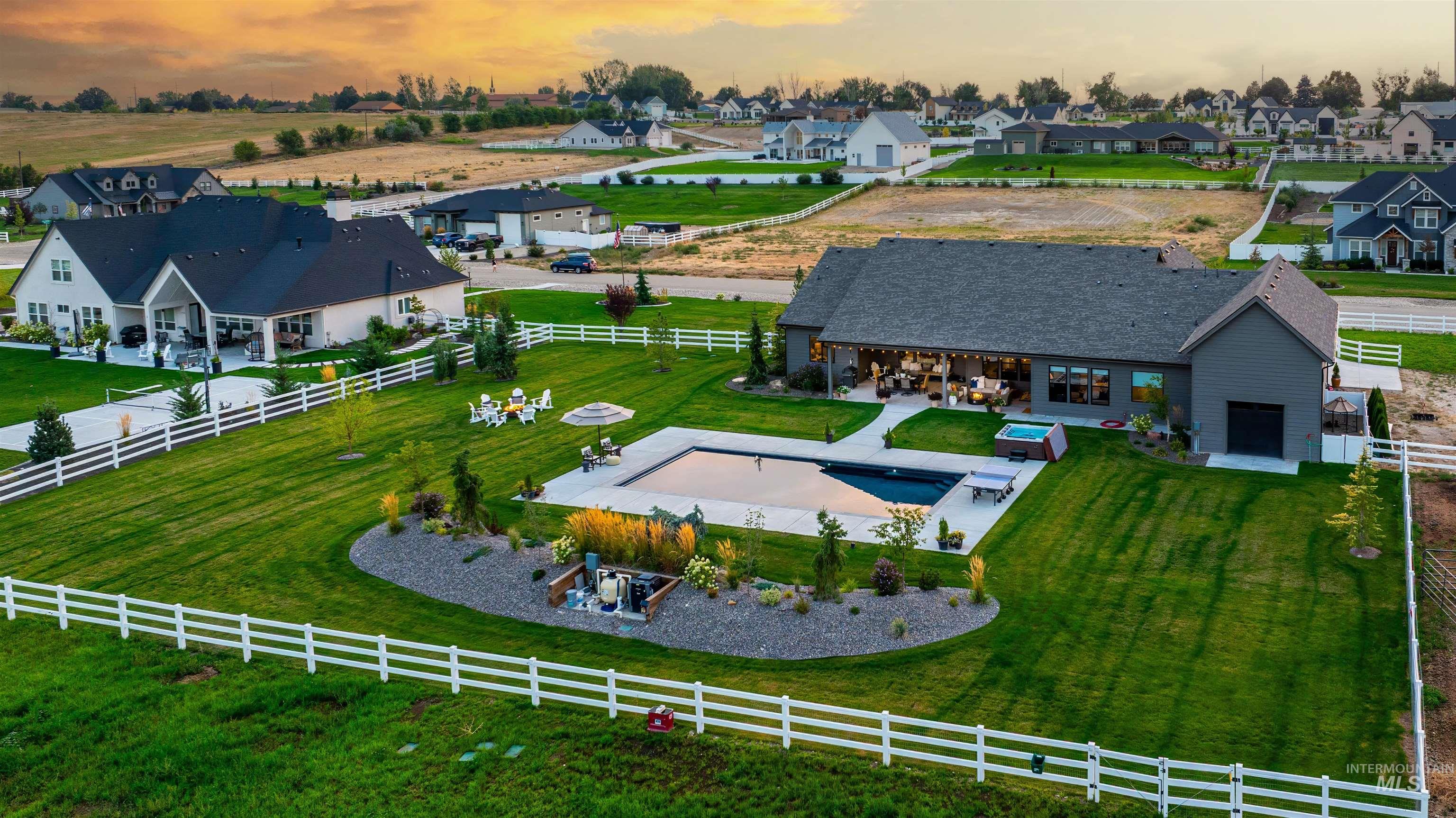 23910 Timber Hls Road Caldwell, ID 83607 - Photo 47 of 50 Overview of rural landscape with a pool area and nearby suburban area