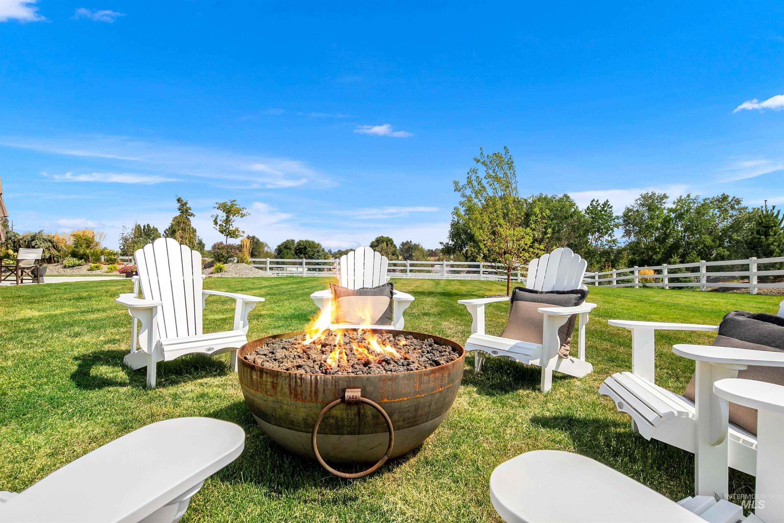23910 Timber Hls Road Caldwell, ID 83607 - Photo 5 of 50 View of yard with a fire pit and a patio