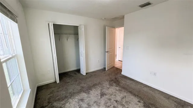 an empty room with window