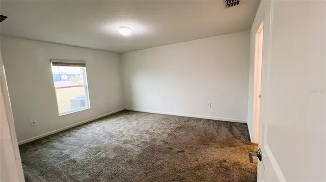 an empty room with a window