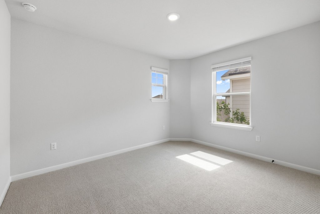 8001 Andravida Drive Austin, TX 78747 - Photo 25 of 35 Home offers three, light-filled secondary bedrooms with flexible, functional space and spacious closets