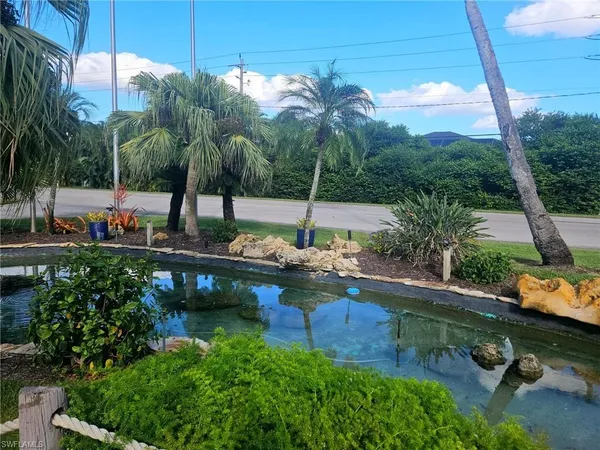 a view of a lake with a house
