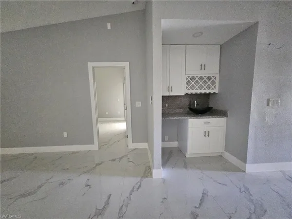 a view of a storage and utility room