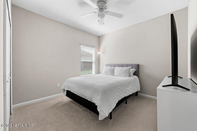 547 Tynes Boulevard Middleburg, FL 32068 - Photo 13 of 33 a bedroom with a bed and a window
