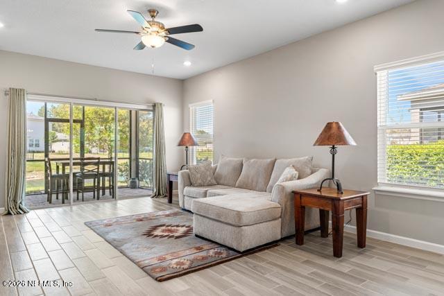547 Tynes Boulevard Middleburg, FL 32068 - Photo 17 of 33 a living room with furniture and a window