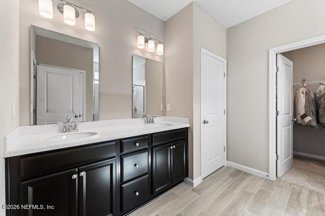 547 Tynes Boulevard Middleburg, FL 32068 - Photo 21 of 33 a kitchen with a sink and a mirror