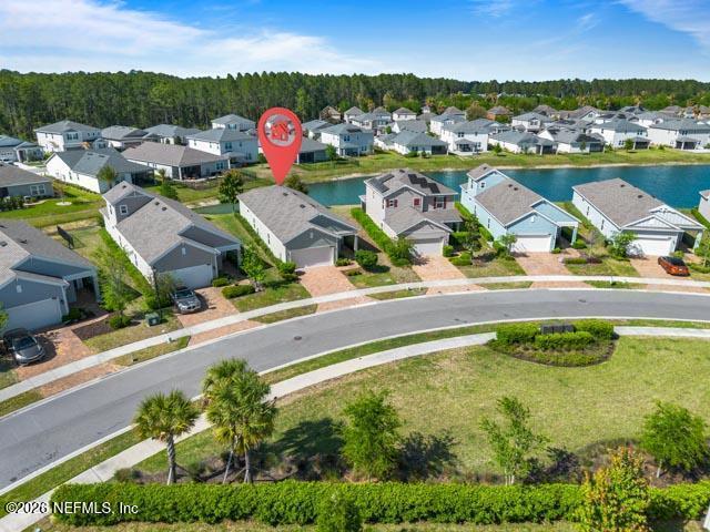 547 Tynes Boulevard Middleburg, FL 32068 - Photo 32 of 33 an aerial view of residential houses with outdoor space and swimming pool