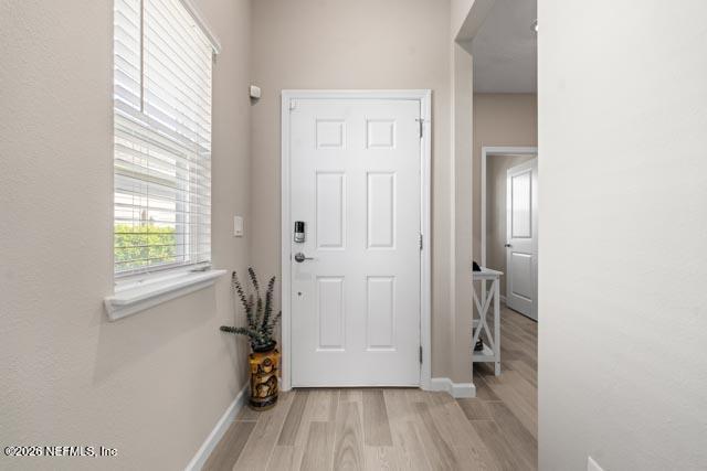 547 Tynes Boulevard Middleburg, FL 32068 - Photo 7 of 33 a view of a room with wooden floor and a window