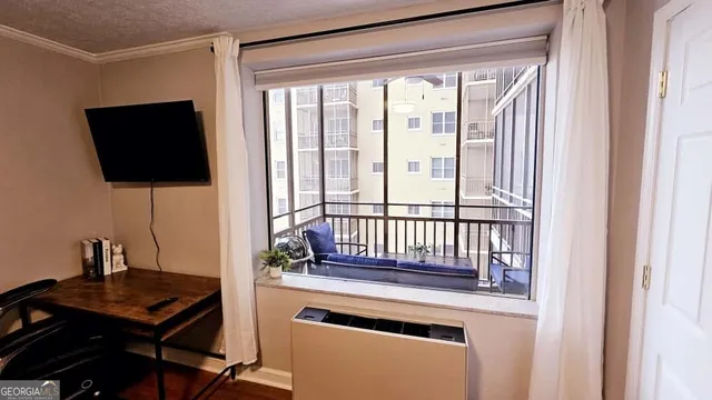 a living room with a rug