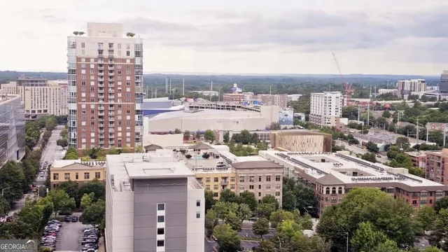 a view of city with tall buildings