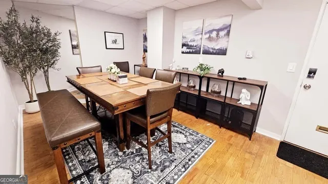 a bedroom with a bed a desk and chair