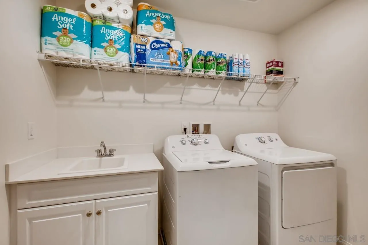 10633 Busch Street Spring Valley, CA 91978 - Photo 16 of 28 a utility room with dryer and washer