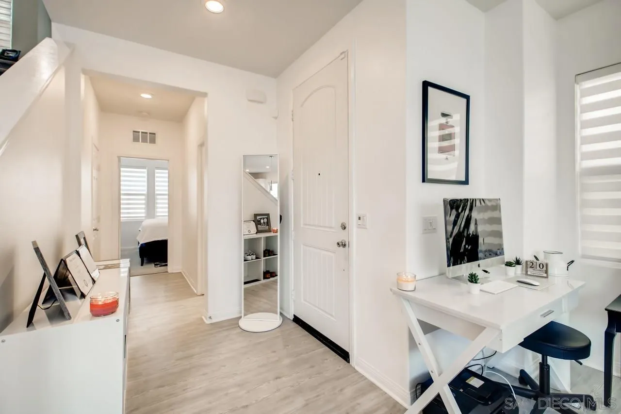 10633 Busch Street Spring Valley, CA 91978 - Photo 9 of 28 a view of a livingroom with furniture and windows