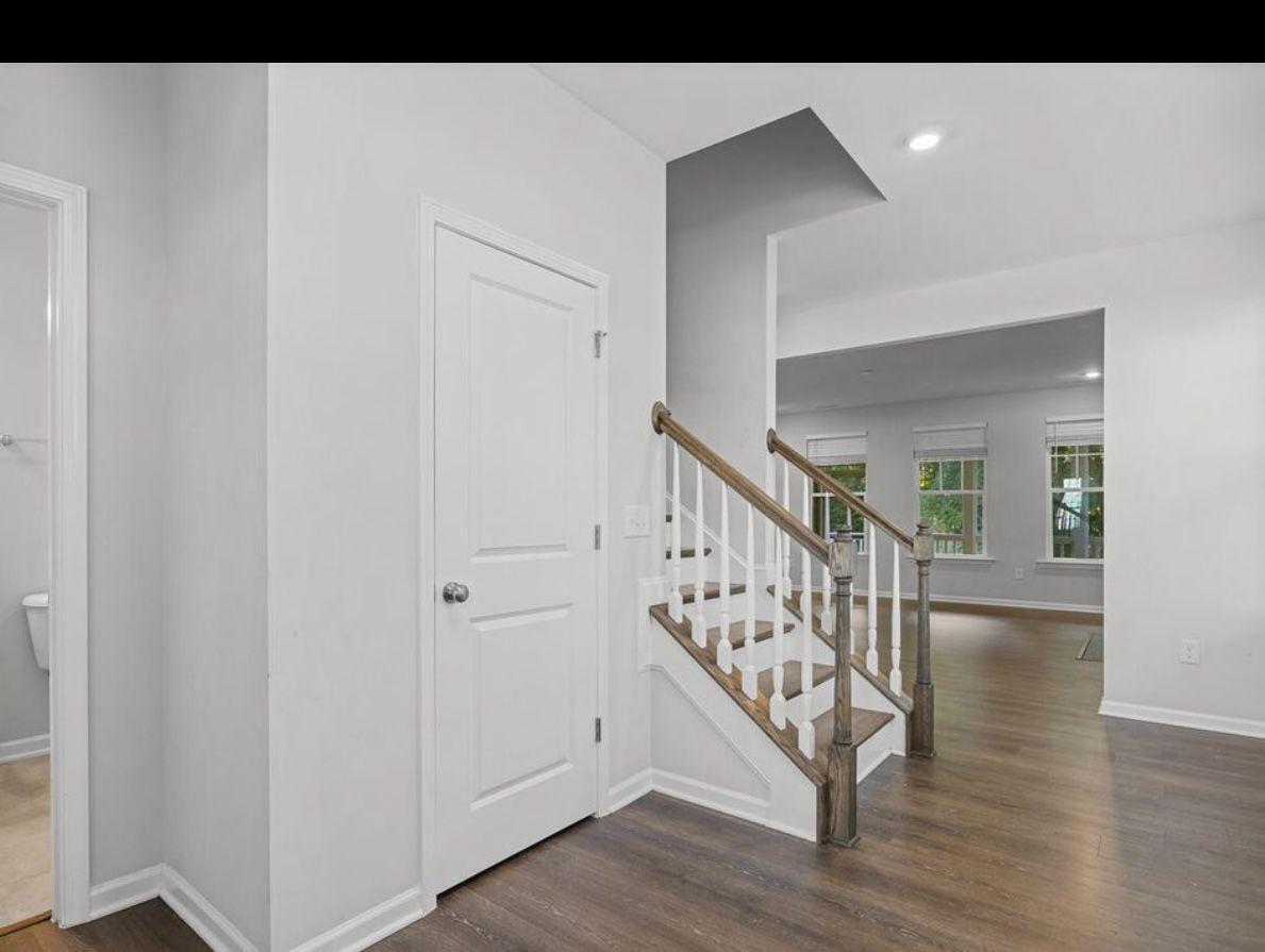 154 Attavar Way Garner, NC 27529 - Photo 6 of 22 a view of entryway with wooden floor