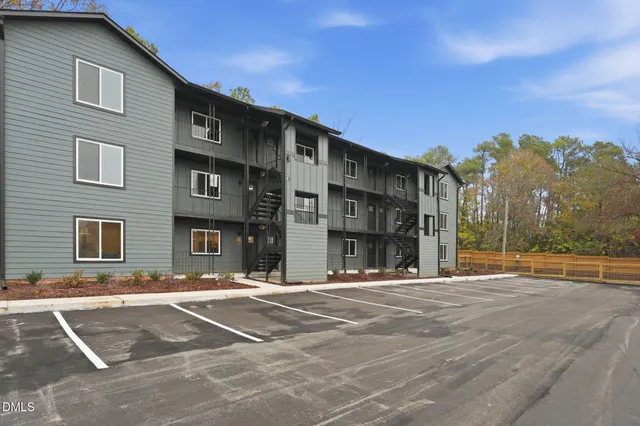 a view of a building with a street