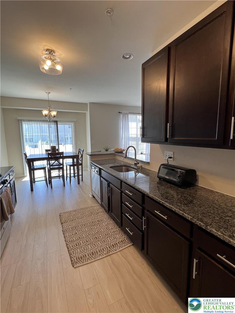 5380 Jutland Road Allentown, PA 18104 - Photo 7 of 27 An inviting kitchen space features ample cabinet storage and sleek countertops.