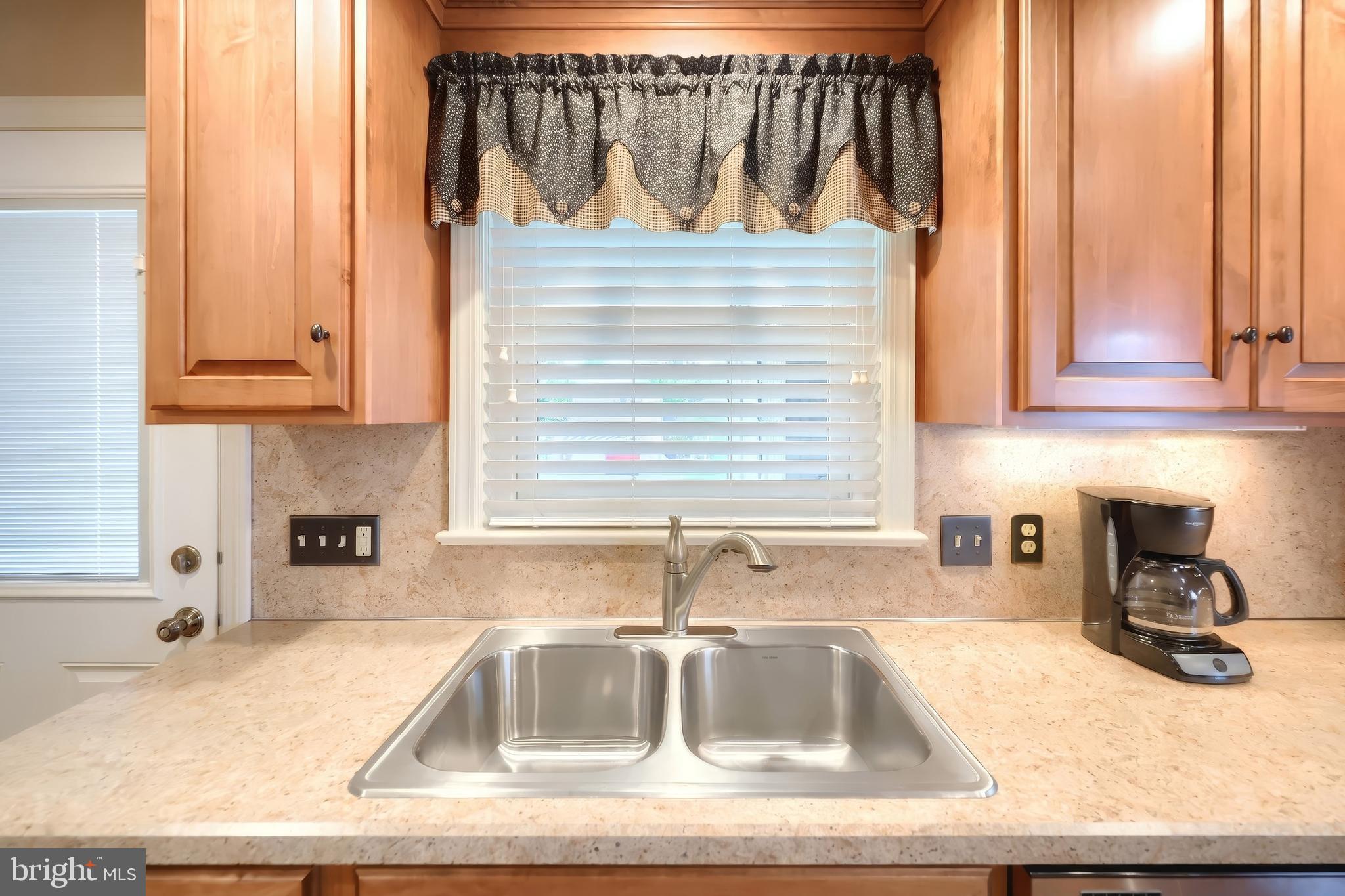 256 North Main Street Manchester, PA 17345 - Photo 10 of 38 a kitchen with a sink and a window