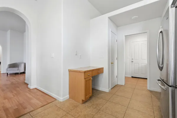 a view of a storage & utility room with a sink