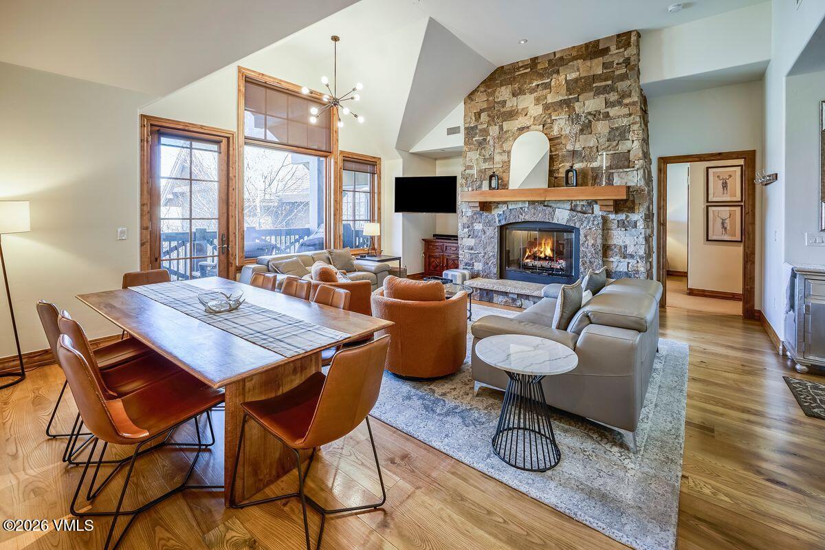 300 Prater Road, Unit A408 Beaver Creek, CO 81620 - Photo 1 of 31 a living room with fireplace furniture and a large window