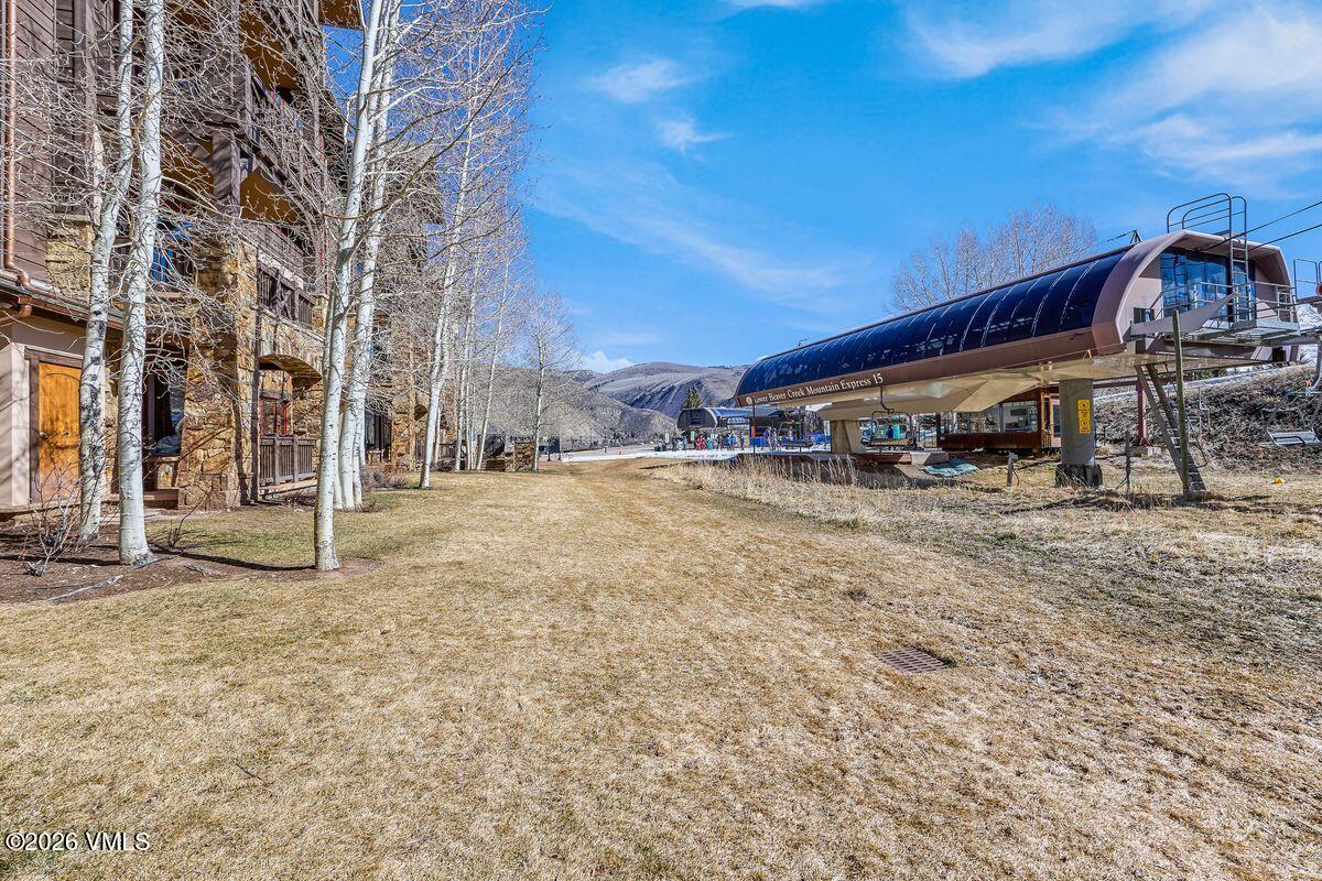 300 Prater Road, Unit A408 Beaver Creek, CO 81620 - Photo 28 of 31 a view of a house with a yard