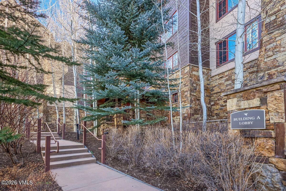 300 Prater Road, Unit A408 Beaver Creek, CO 81620 - Photo 31 of 31 a view of a brick building with many windows