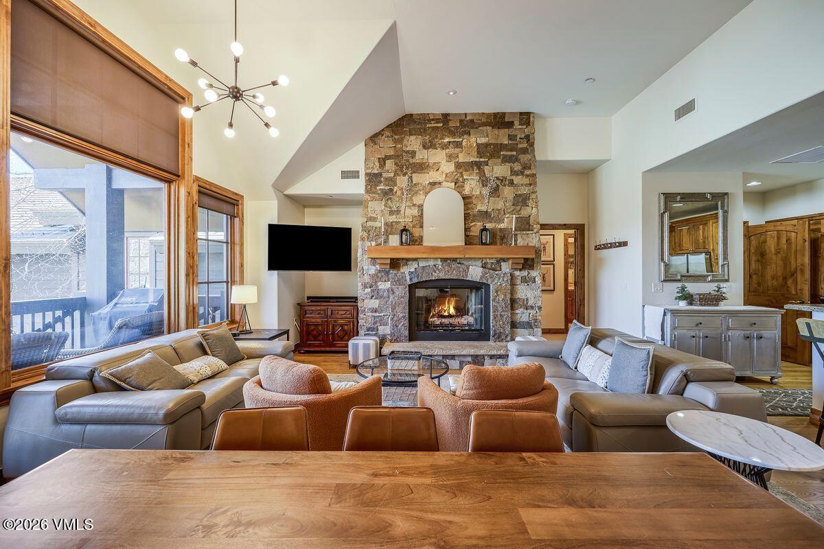 300 Prater Road, Unit A408 Beaver Creek, CO 81620 - Photo 4 of 31 a living room with furniture fireplace and flat screen tv