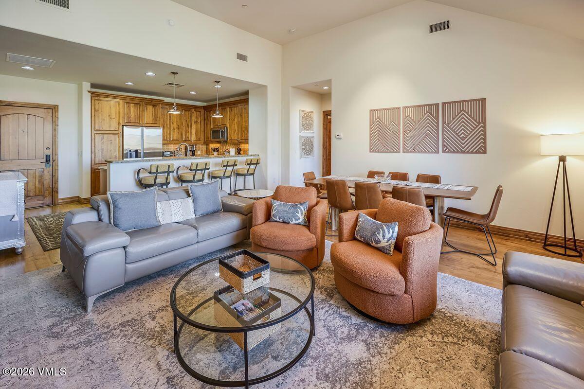 300 Prater Road, Unit A408 Beaver Creek, CO 81620 - Photo 5 of 31 a living room with furniture and a large window