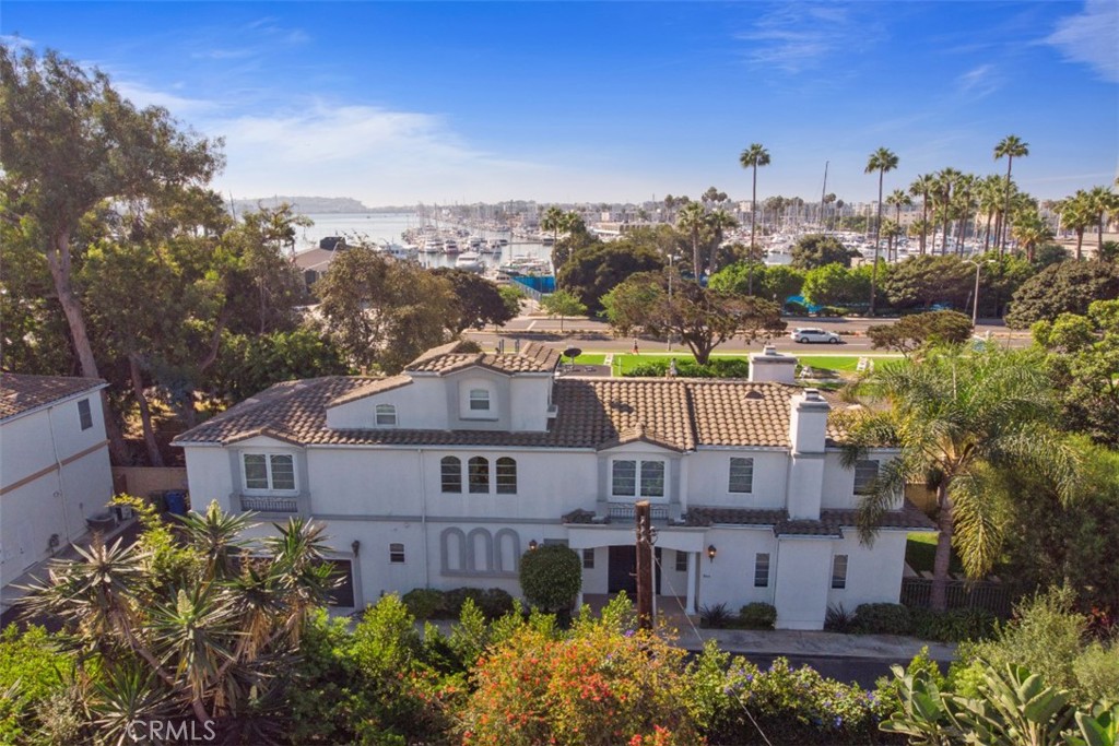 a aerial view of a house with a yard and garden