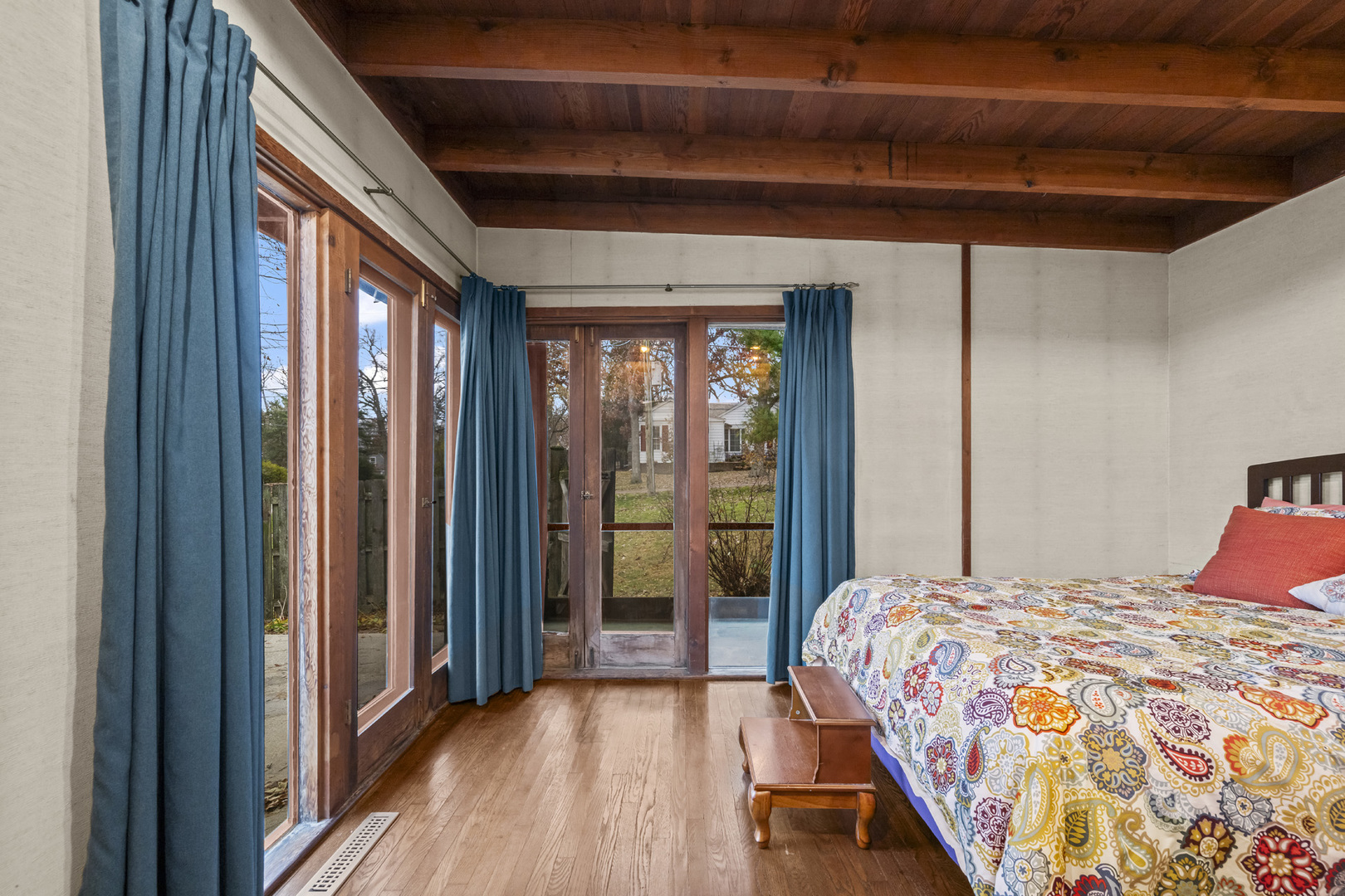 2345 North McAree Road Waukegan, IL 60087 - Photo 21 of 40 a bedroom with a bed and a large window with balcony view