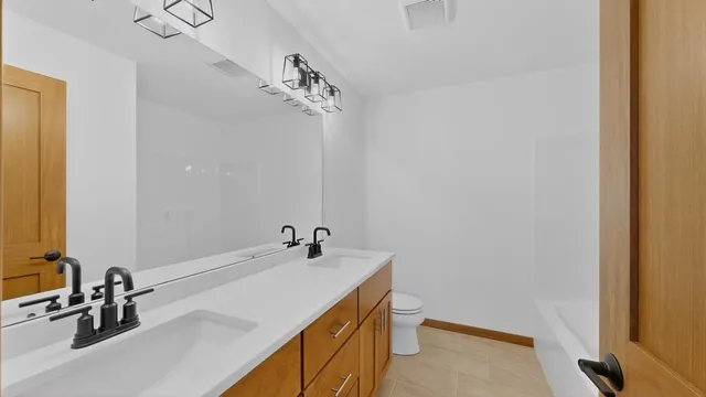 $460,000 | 2163 Hadley Hills Drive Northeast, Rochester, MN 55906