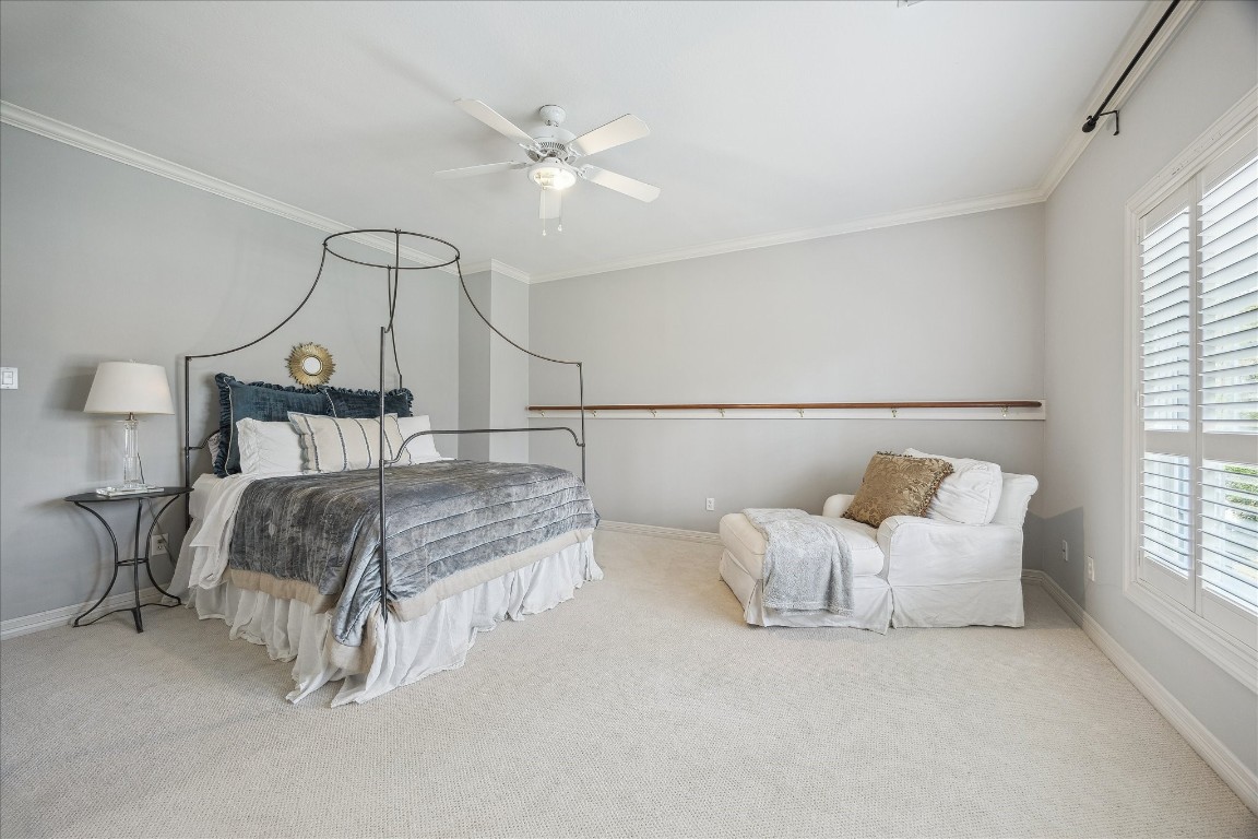 11524 Taylorcrest Road Houston, TX 77024 - Photo 39 of 47 The light-filled fourth upstairs bedroom features a large window with plantation shutters and new carpet.