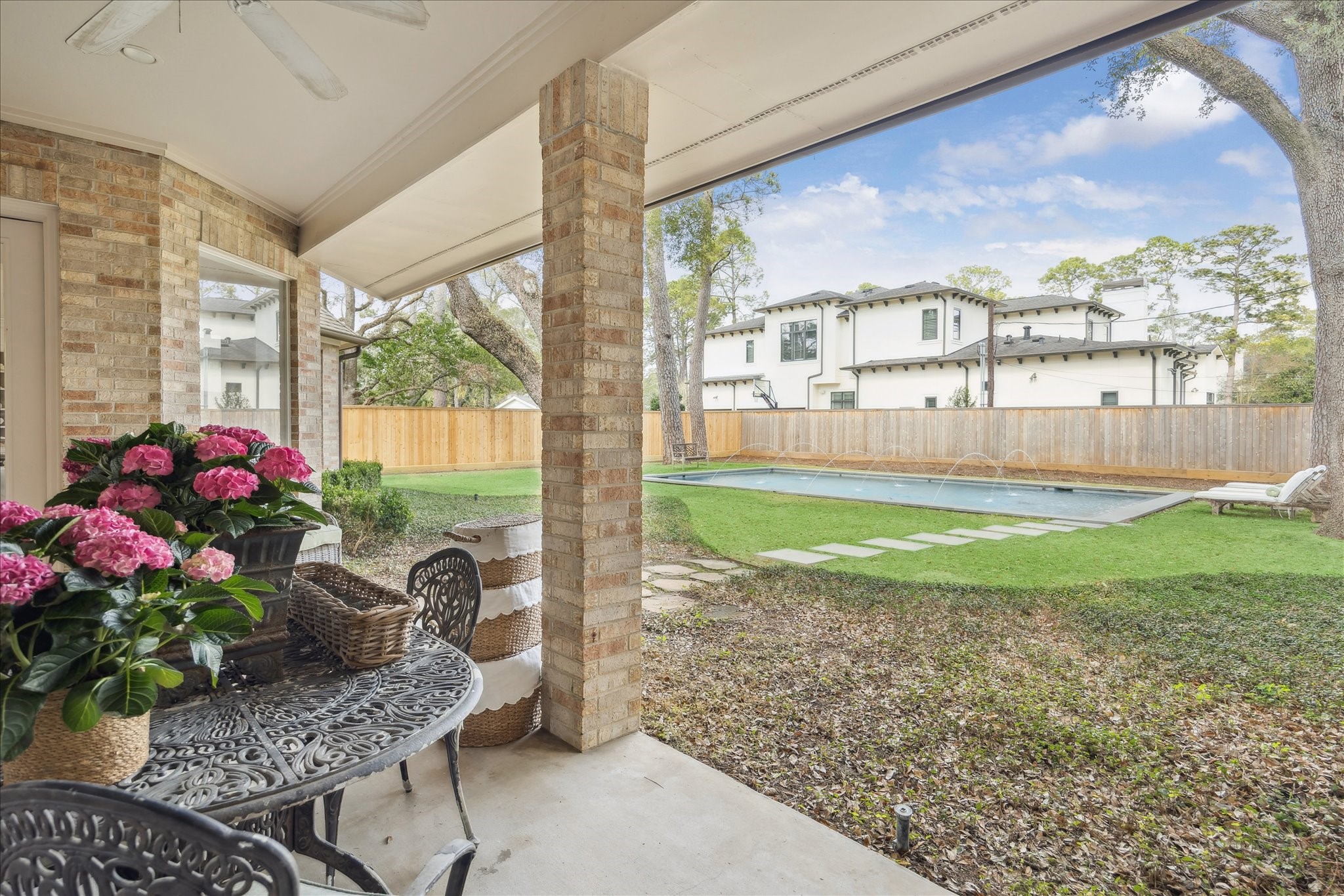 11524 Taylorcrest Road Houston, TX 77024 - Photo 41 of 47 Charming covered back patio overlooking the expansive yard