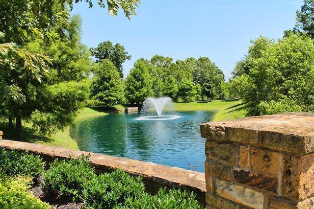 1042 Oglethorpe Drive Franklin, TN 37064 - Photo 17 of 30 a view of a lake from a yard