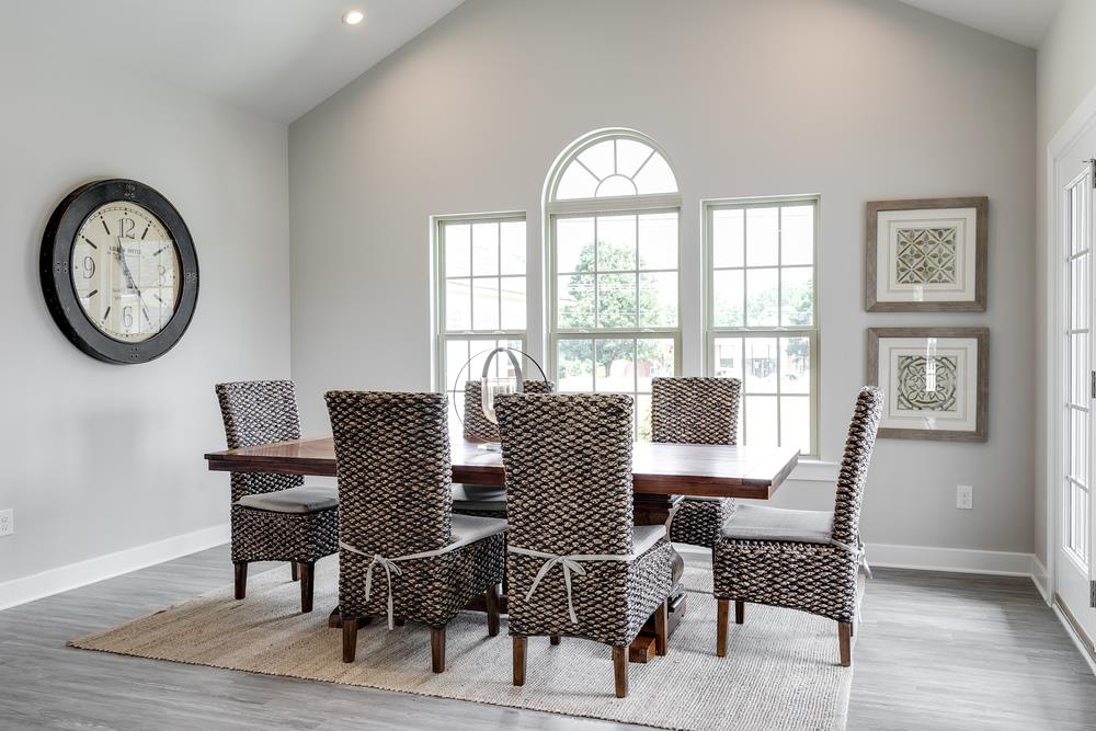 1042 Oglethorpe Drive Franklin, TN 37064 - Photo 8 of 30 a view of a dining room with furniture window and wooden floor