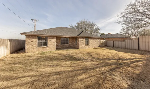 a front view of a house with a garage