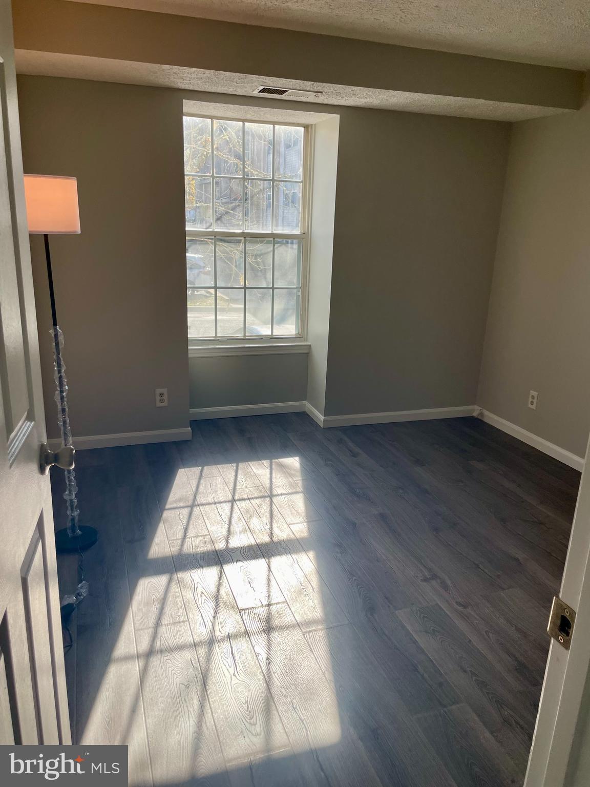 17 Cranberry Court Marlton, NJ 08053 - Photo 12 of 17 an empty room with wooden floor and windows