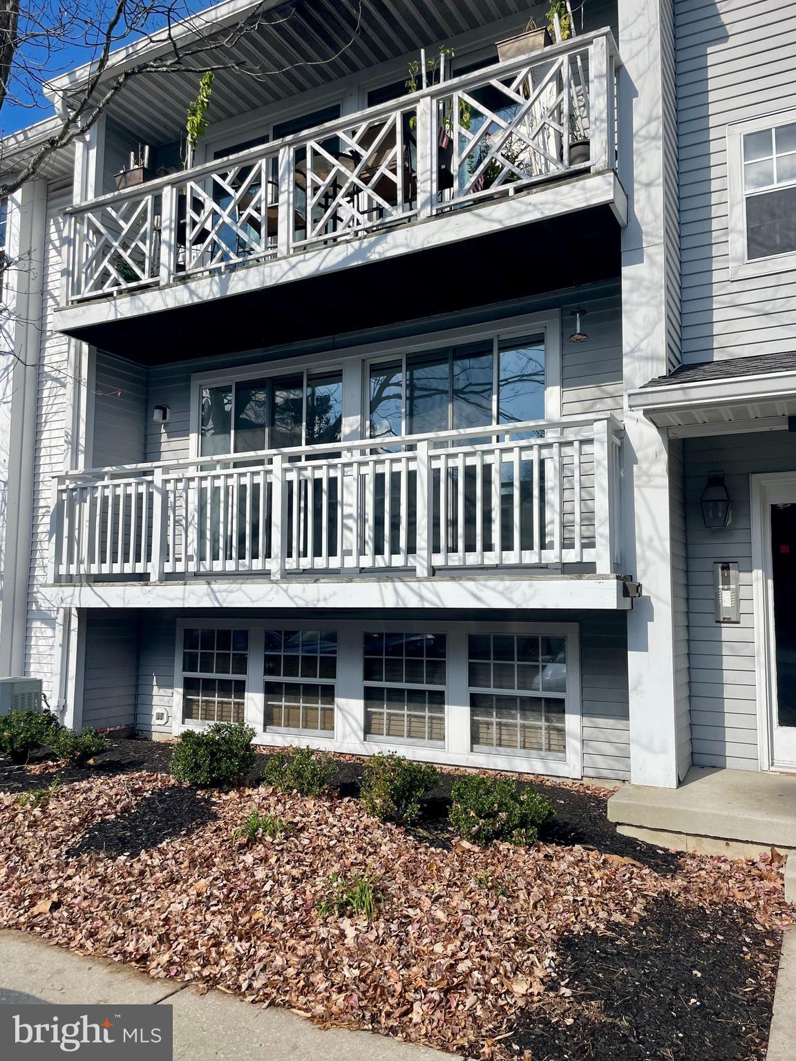 17 Cranberry Court Marlton, NJ 08053 - Photo 2 of 17 a front view of a house with a garden
