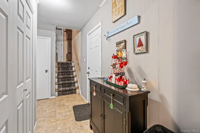 a kitchen with a stove top oven a sink and a refrigerator