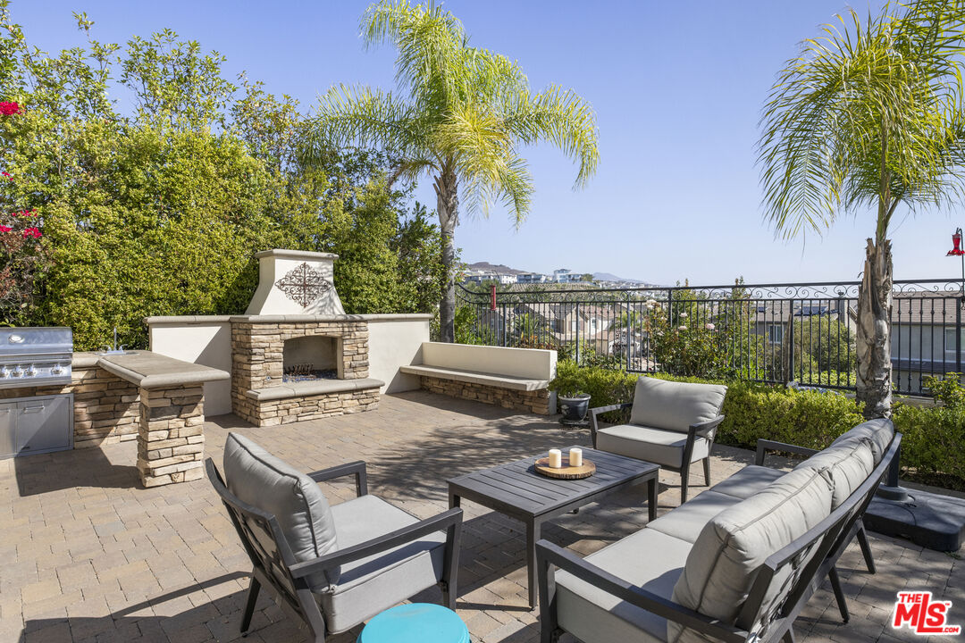 11540 Apulia Court Porter Ranch, CA 91326 - Photo 8 of 25 a view of a terrace with furniture