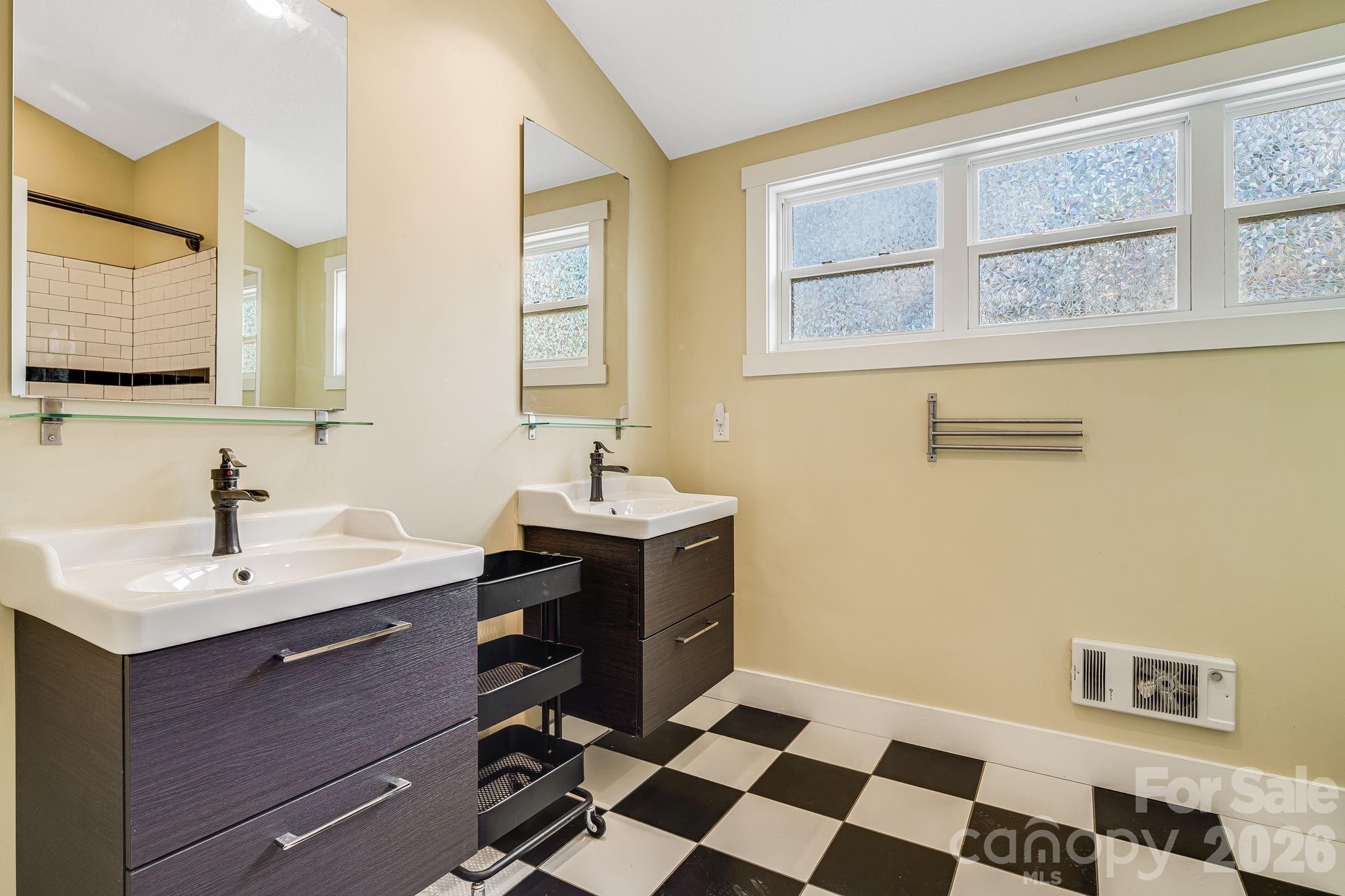 309 London Road Asheville, NC 28803 - Photo 14 of 41 a hall with a sink cabinets and a window