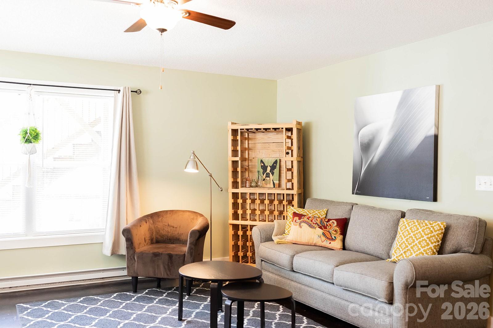 309 London Road Asheville, NC 28803 - Photo 20 of 41 a living room with furniture and a large window