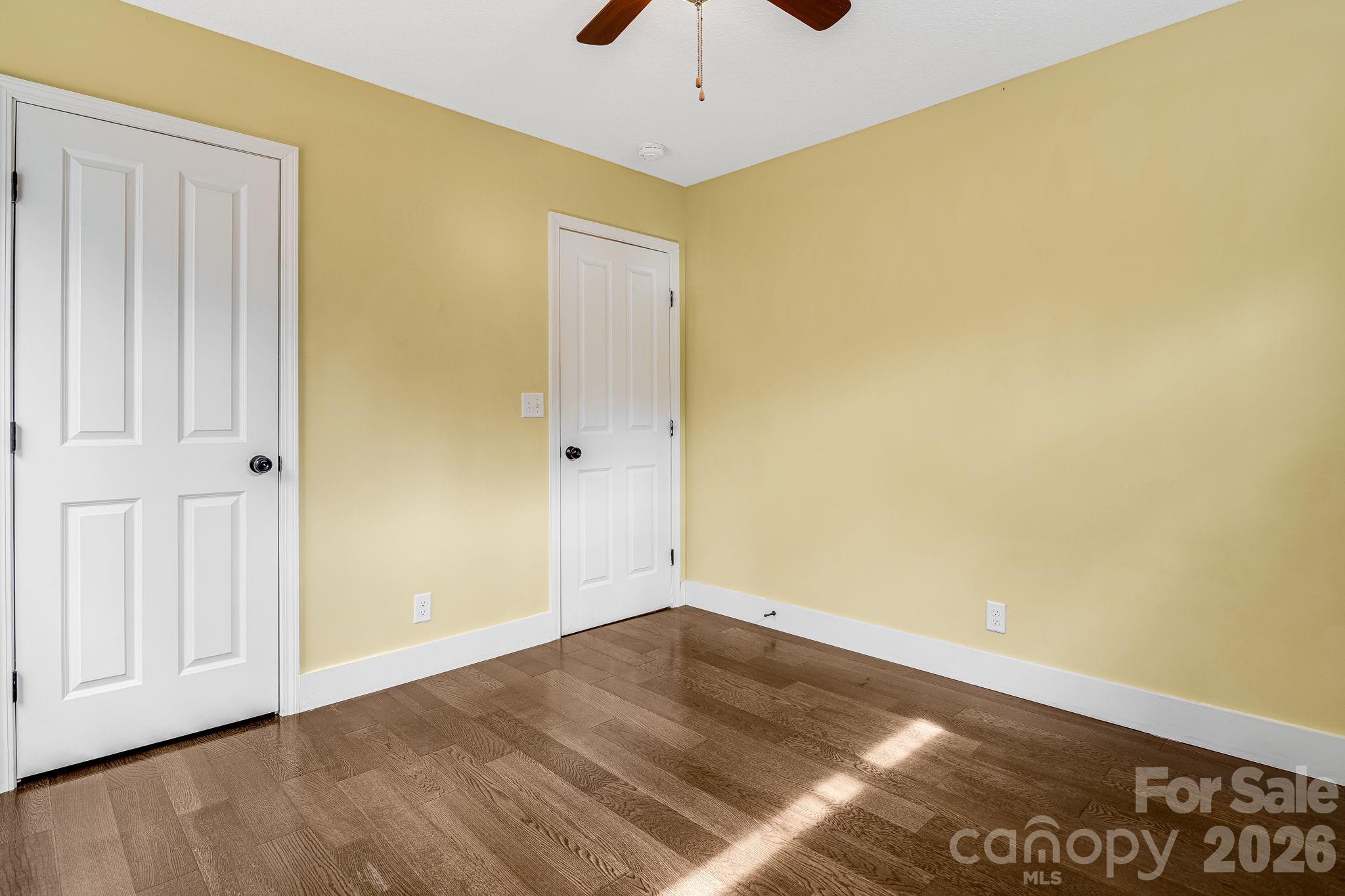 309 London Road Asheville, NC 28803 - Photo 33 of 41 a view of an empty room with wooden floor