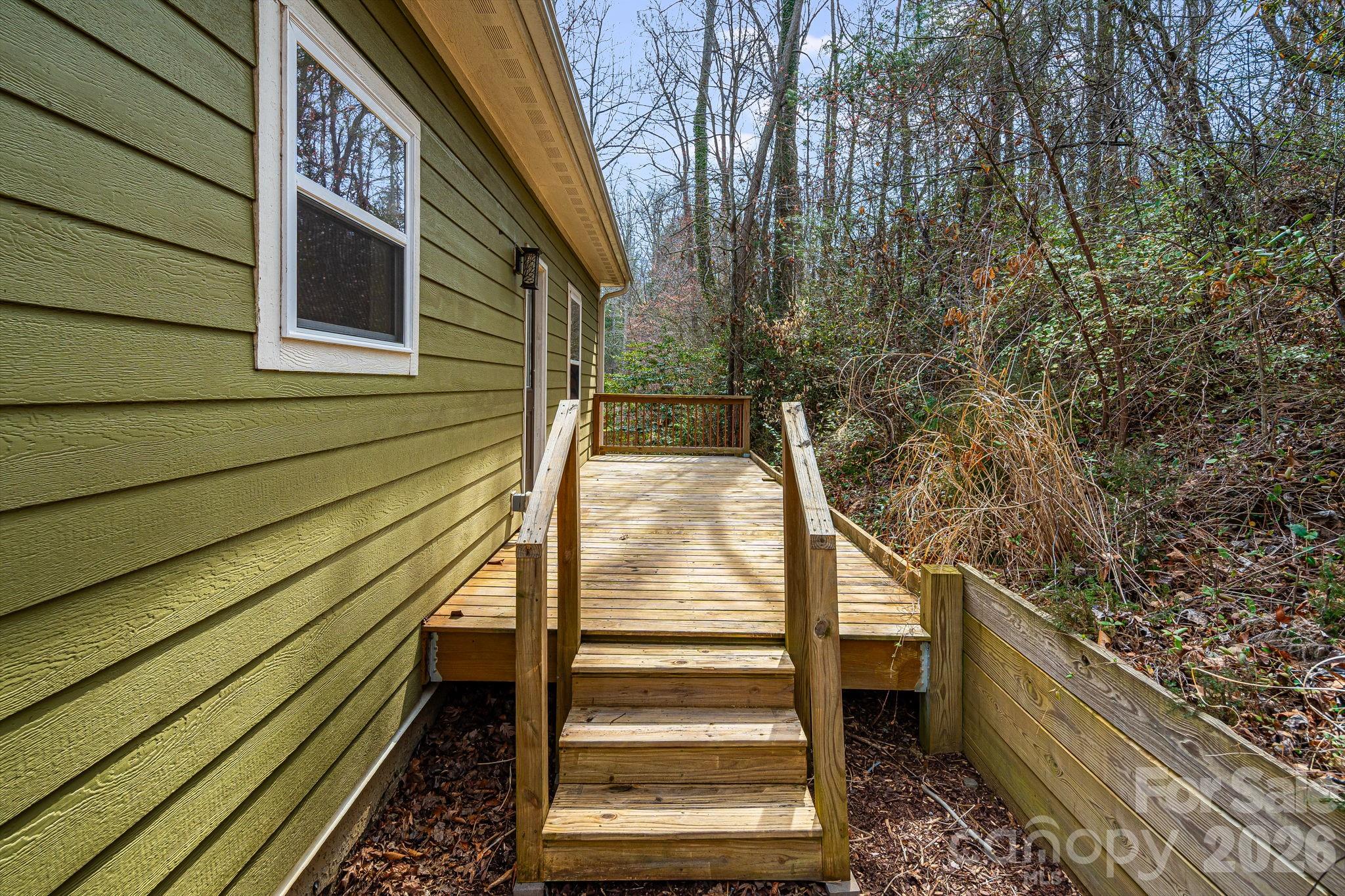 309 London Road Asheville, NC 28803 - Photo 39 of 41 a view of balcony with wooden floor and fence